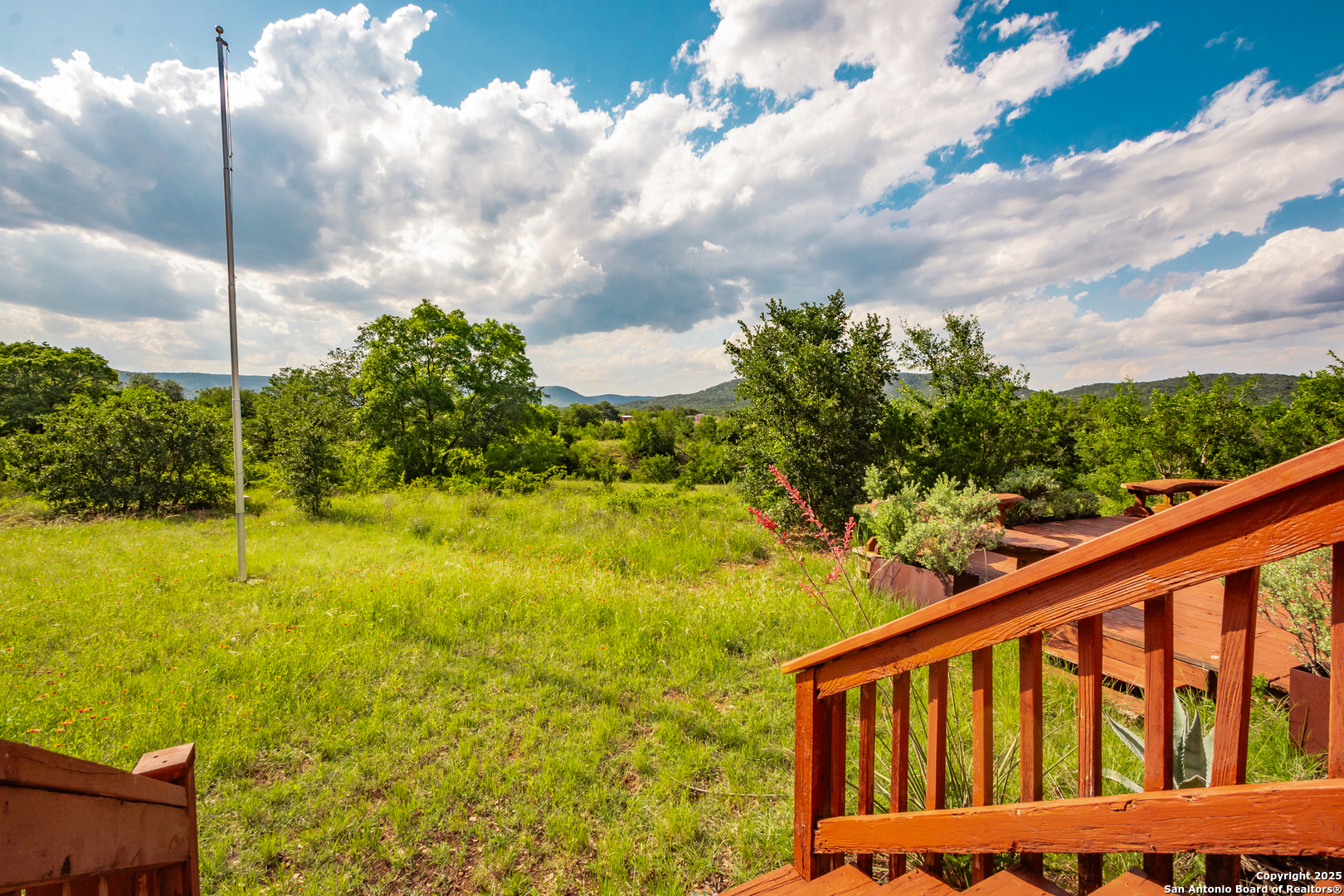2925 County Road 361 Utopia, TX 78884 - Photo 23 of 35 a view of a balcony with an ocean view