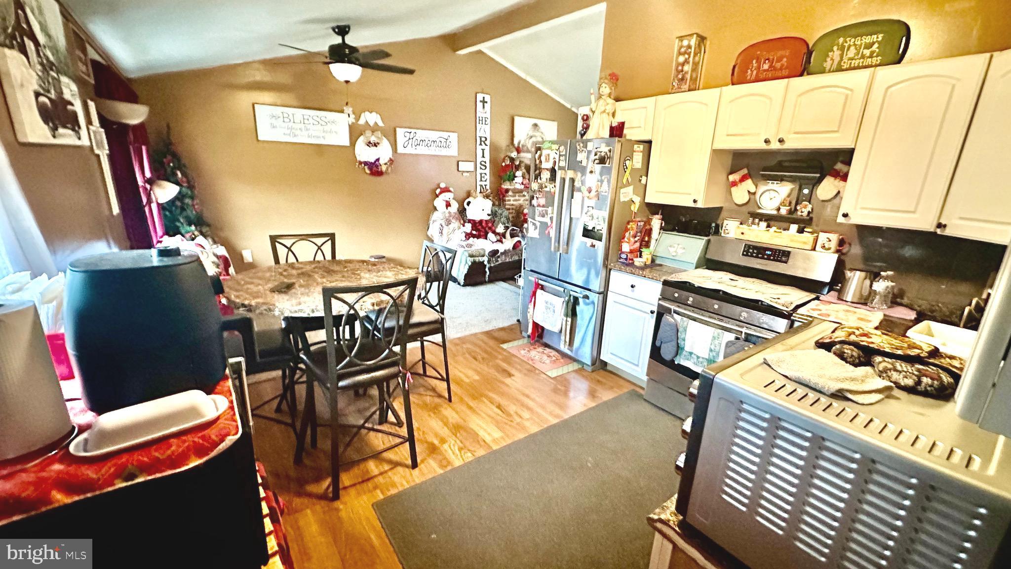 69 High Street Leesburg, NJ 08327 - Photo 19 of 34 a view of a dining room with furniture and chandelier