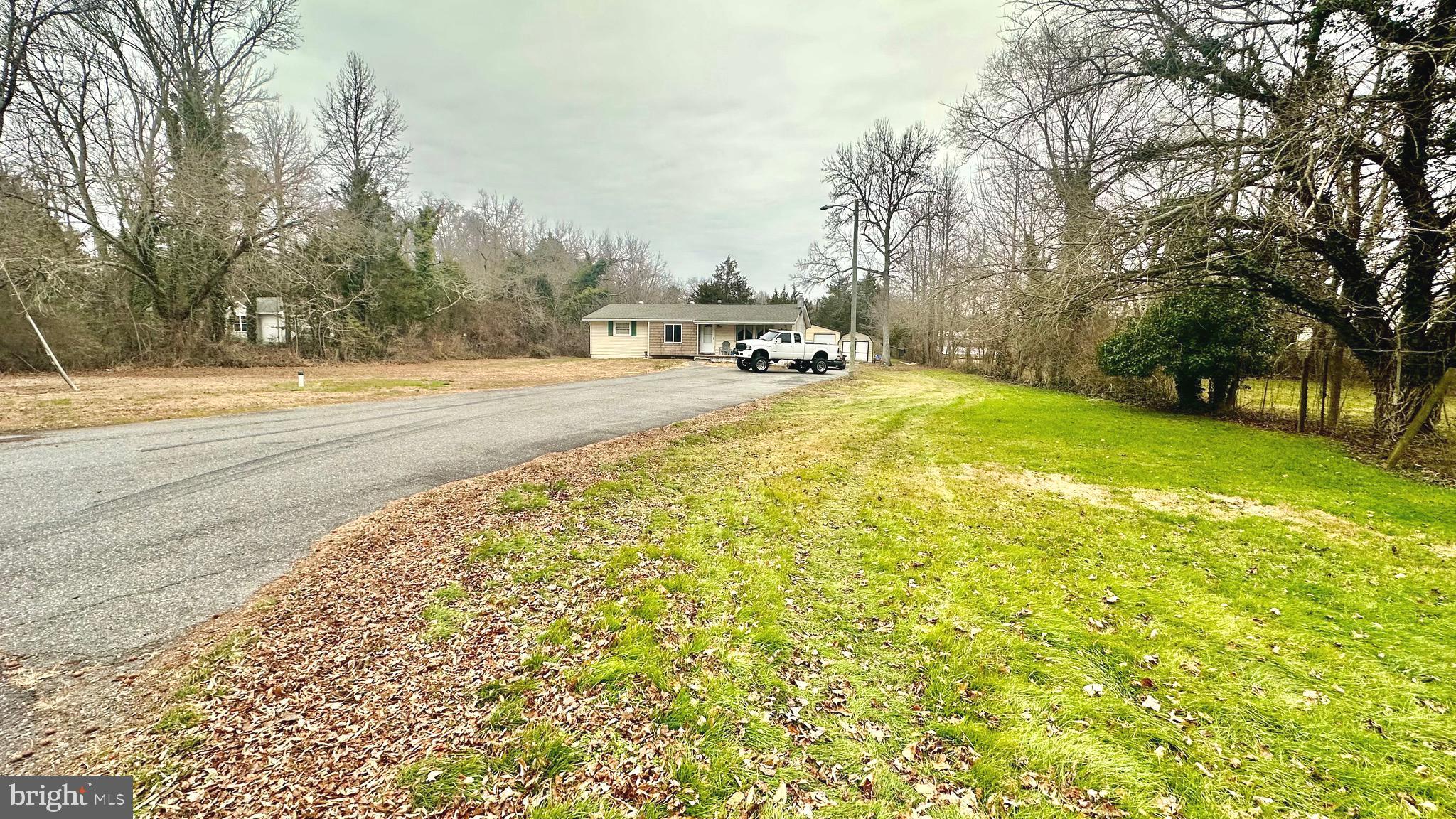 69 High Street Leesburg, NJ 08327 - Photo 2 of 34 a swimming pool view with a outdoor seating
