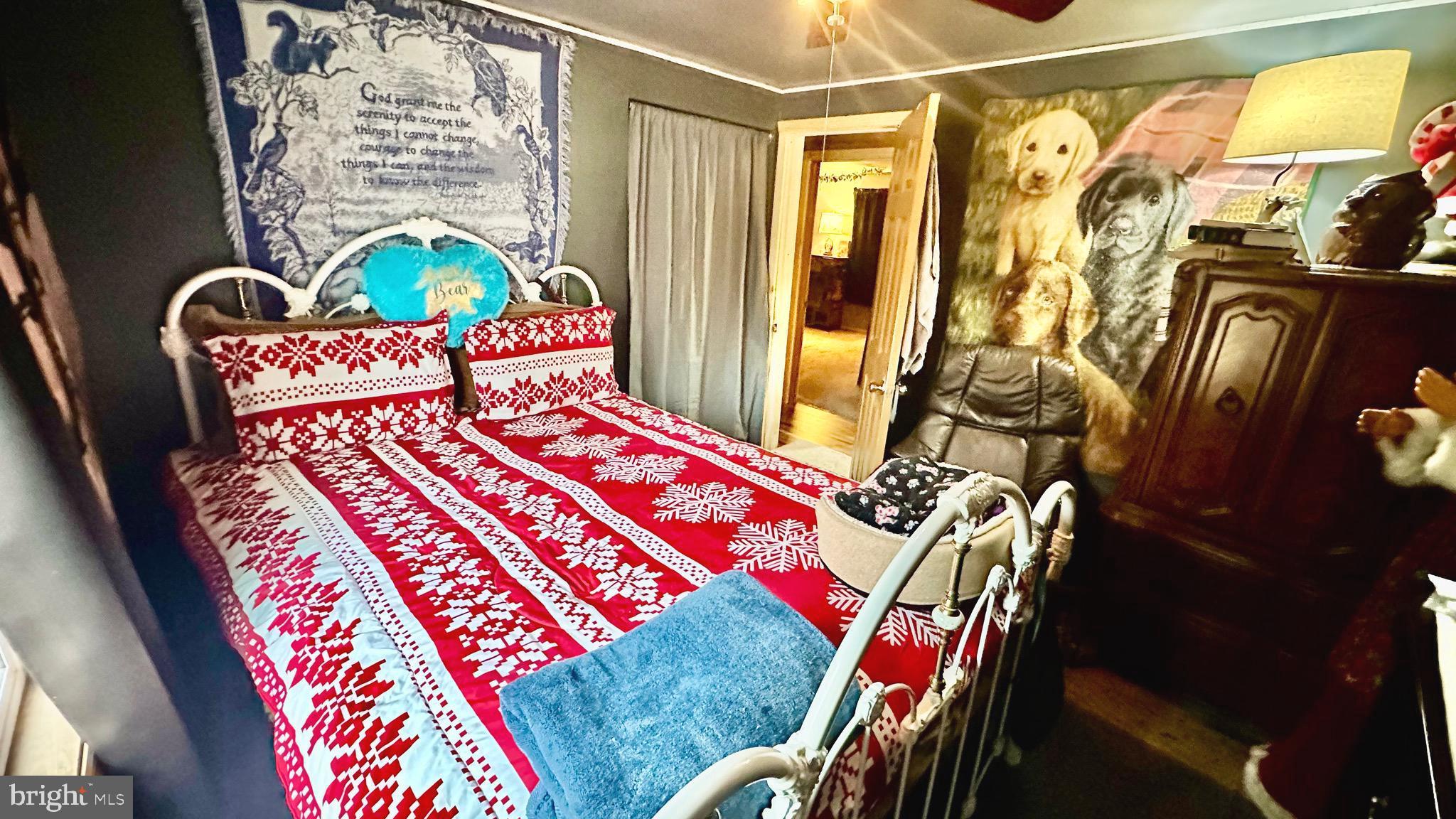 69 High Street Leesburg, NJ 08327 - Photo 23 of 34 a bedroom with a bed and a window