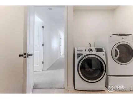 a living room with lots of furniture and a flat screen tv