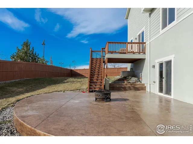 a view of a balcony with wooden floor