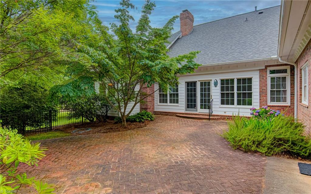 1531 Carters Grove Road Clemmons, NC 27012 - Photo 34 of 35 Private gated brick patio accessed from kitchen and great room