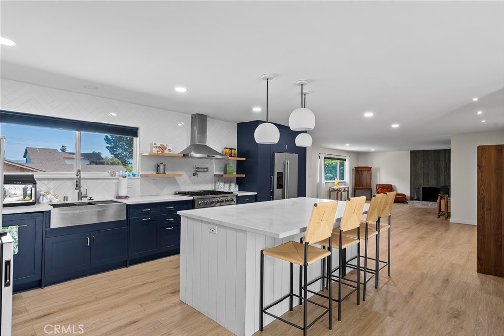 6 Santa Clara Drive Lompoc, CA 93436 - Photo 14 of 40 a large kitchen with a table and chairs