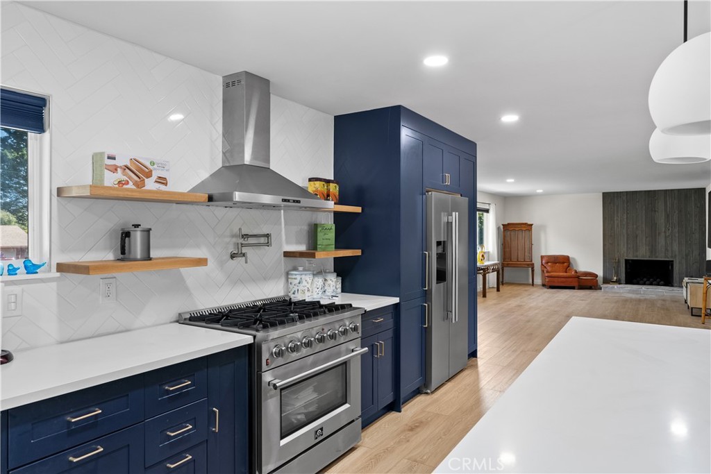 6 Santa Clara Drive Lompoc, CA 93436 - Photo 19 of 40 a kitchen with stainless steel appliances granite countertop a sink stove and refrigerator