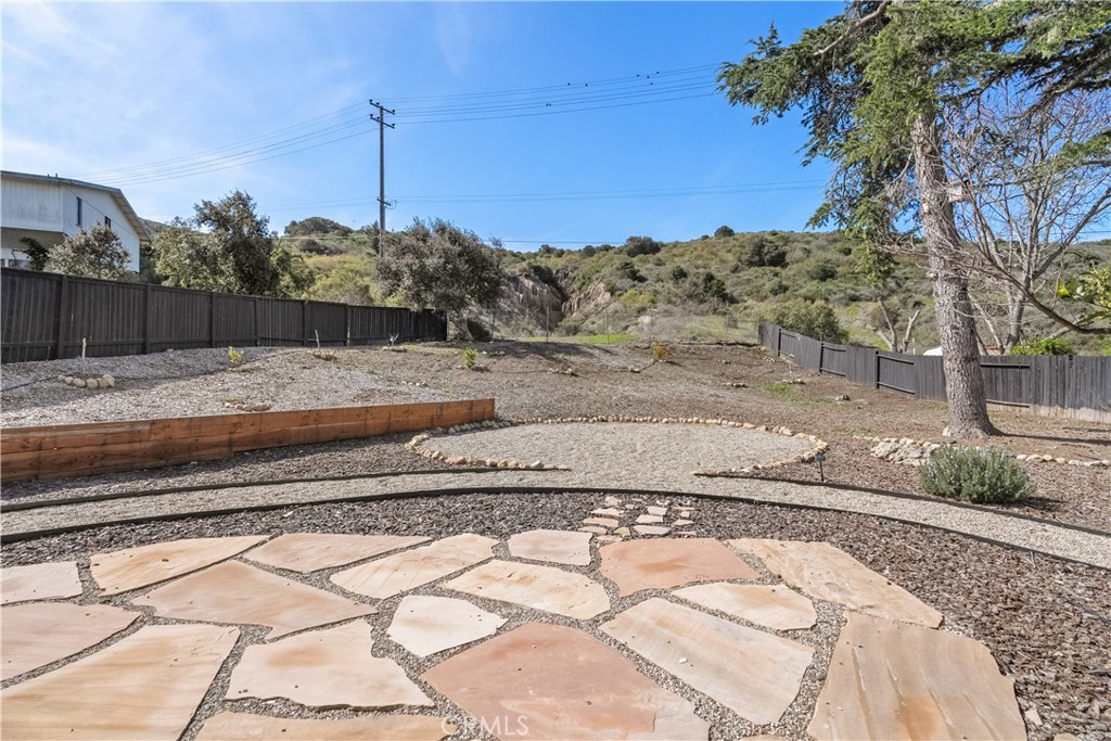 6 Santa Clara Drive Lompoc, CA 93436 - Photo 29 of 40 a view of a yard with wooden fence