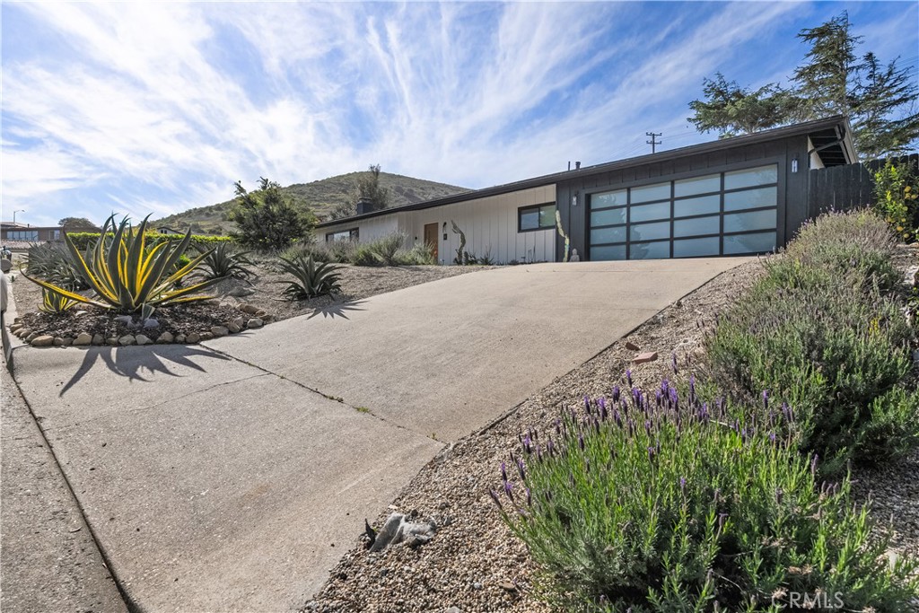 6 Santa Clara Drive Lompoc, CA 93436 - Photo 3 of 40 a front view of house with a garden