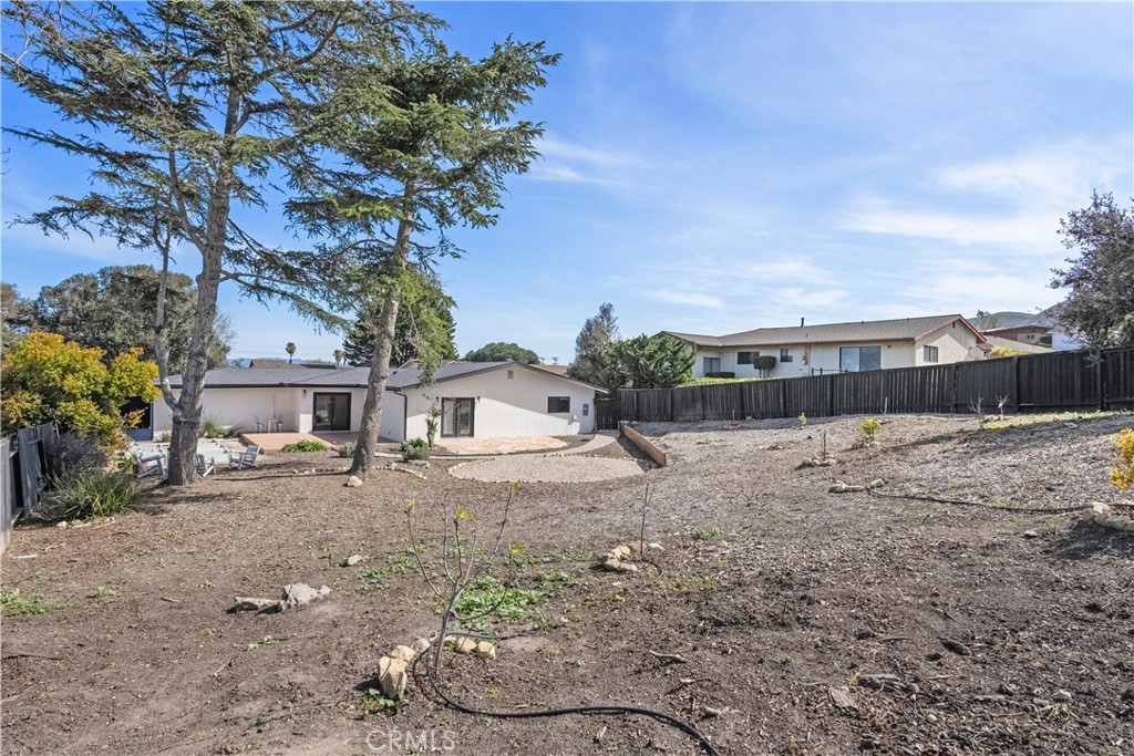6 Santa Clara Drive Lompoc, CA 93436 - Photo 31 of 40 a view of a yard with a house and a tree