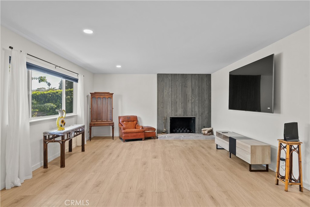 6 Santa Clara Drive Lompoc, CA 93436 - Photo 6 of 40 a living room with furniture a fireplace and a flat screen tv