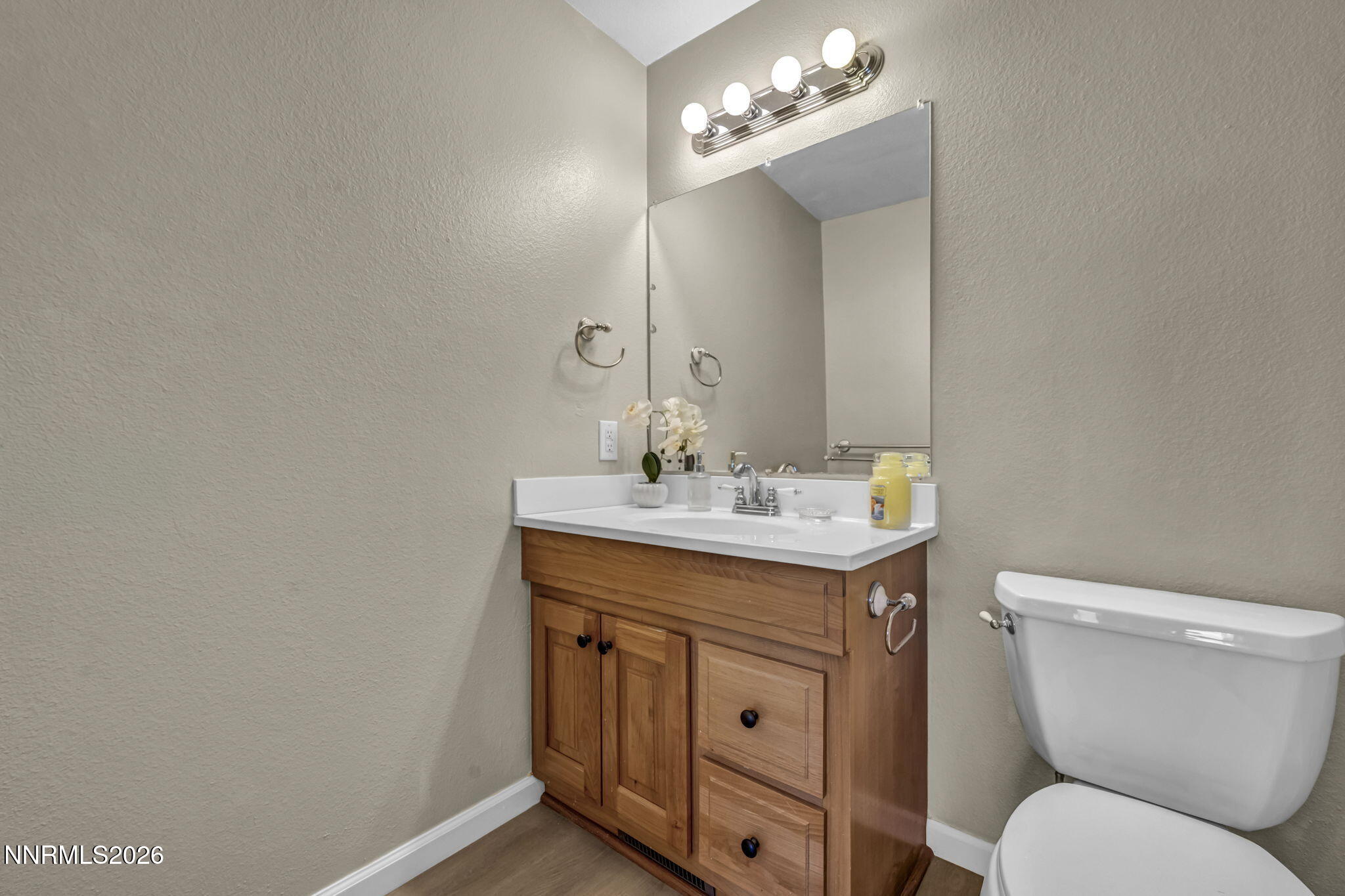 19 Condor Circle Carson City, NV 89701 - Photo 27 of 41 a bathroom with a toilet sink and mirror