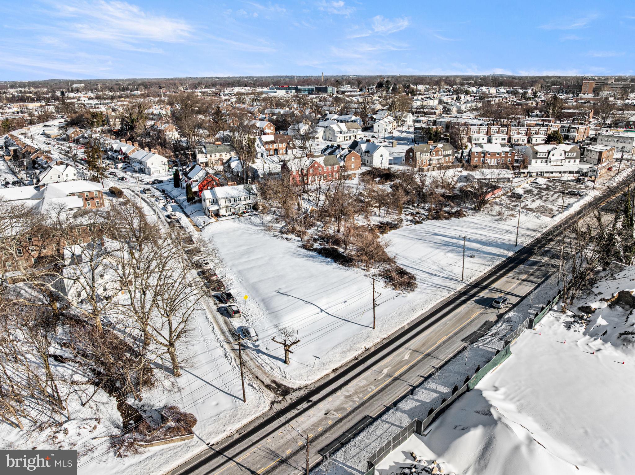 917 Meadow Lane Chester, PA 19013 - Photo 4 of 12 an aerial view of residential houses with city view
