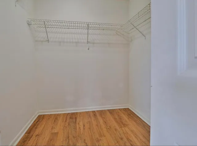 a view of a room with racks on the wall