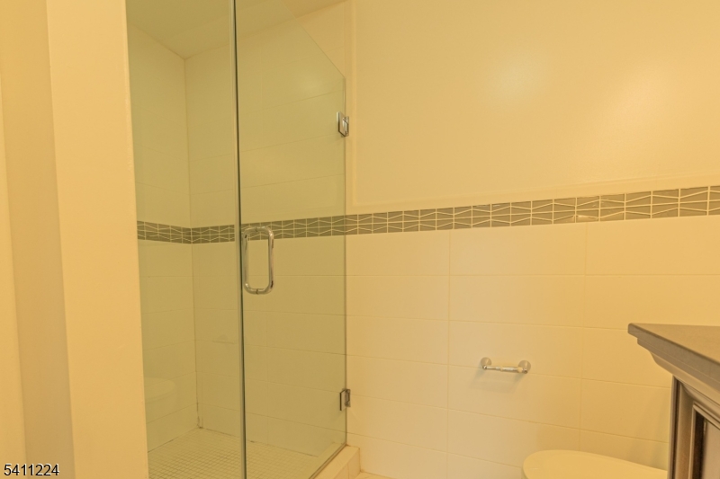 238 James Street Hackensack, NJ 07601 - Photo 19 of 24 a bathroom with a shower