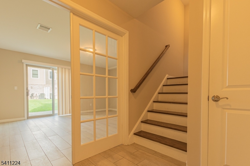 238 James Street Hackensack, NJ 07601 - Photo 5 of 24 a view of entryway with wooden floor
