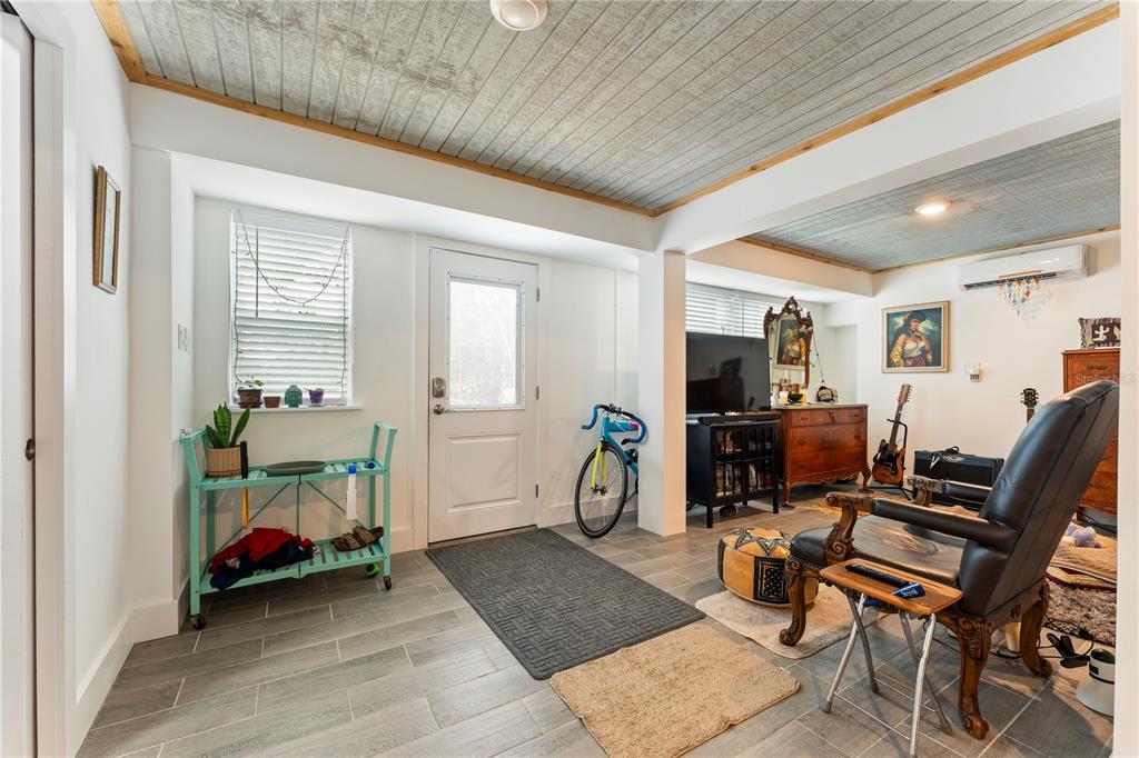 1335 40th Street Sarasota, FL 34234 - Photo 11 of 50 a view of a livingroom with furniture and a workspace