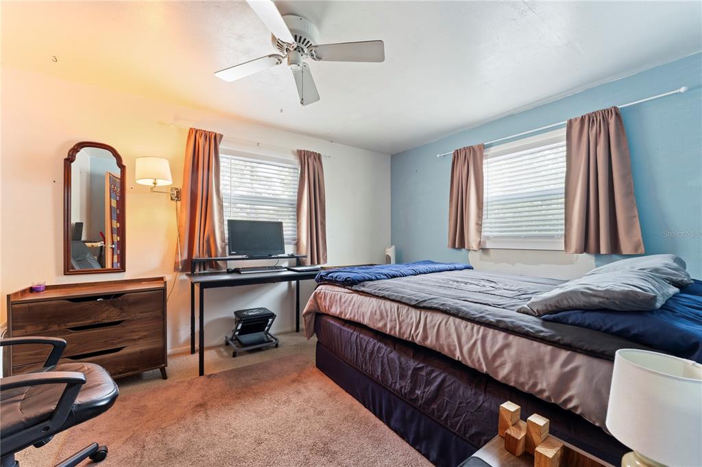 1335 40th Street Sarasota, FL 34234 - Photo 22 of 50 a bedroom with bed and windows