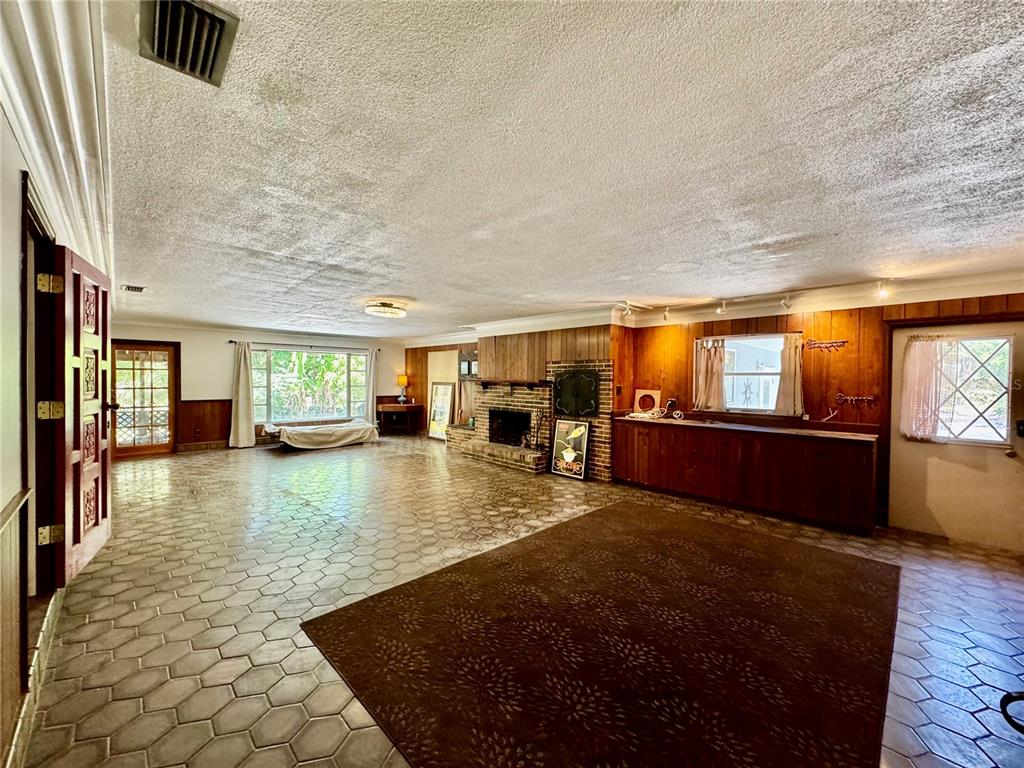 1335 40th Street Sarasota, FL 34234 - Photo 32 of 50 a view of a living room and kitchen floor