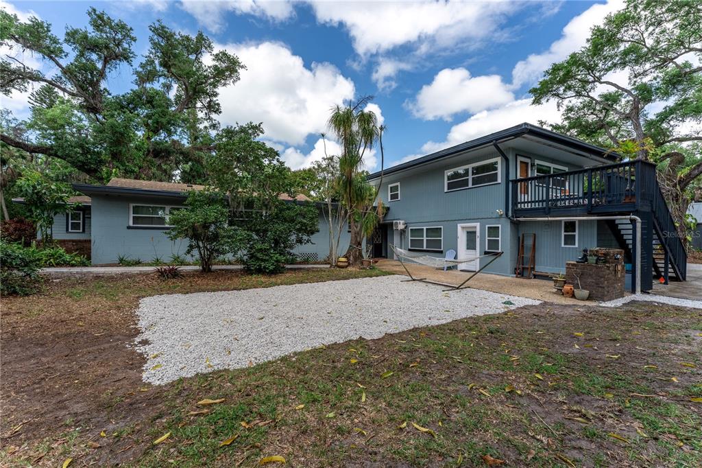 1335 40th Street Sarasota, FL 34234 - Photo 41 of 50 a front view of a house with a yard and garage