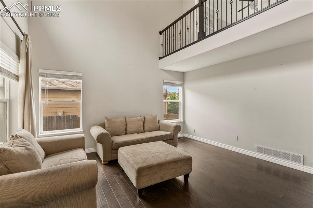 3320 Tail Spin Drive Colorado Springs, CO 80916 - Photo 6 of 28 a living room with furniture and a window