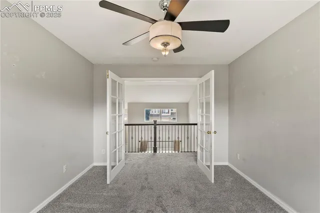 a view of a hallway with a chandelier