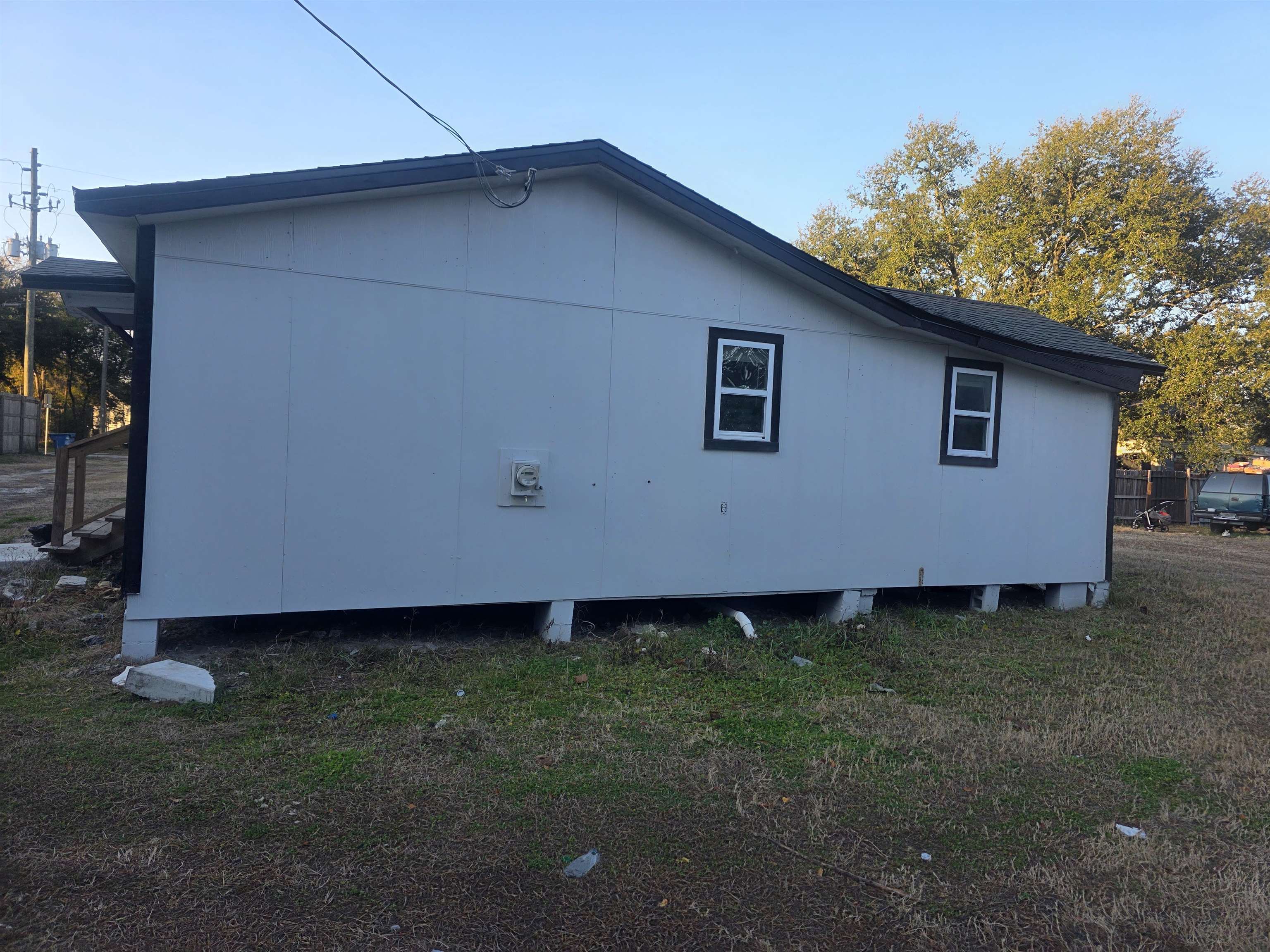 2189 Benedict Road Jacksonville, FL 32209 - Photo 2 of 19 a backyard of a house with lots of green space