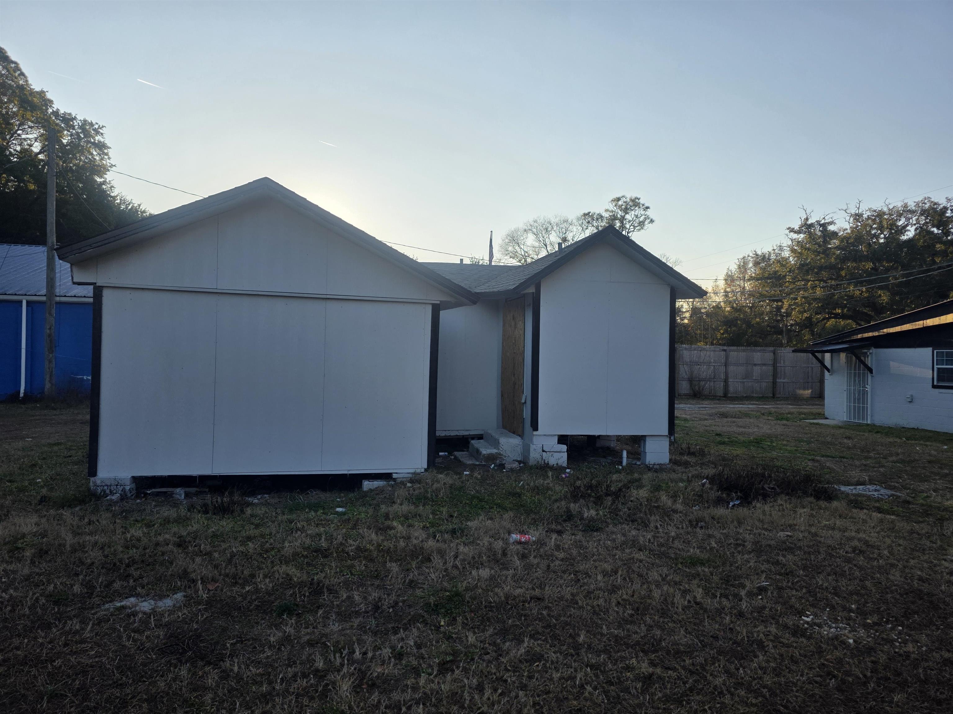 2189 Benedict Road Jacksonville, FL 32209 - Photo 3 of 19 a house with trees in the background
