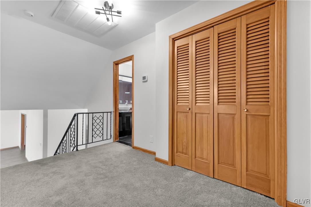 3238 Woodlea Road Orefield, PA 18069 - Photo 12 of 49 top level, large hallway with linen closet leading