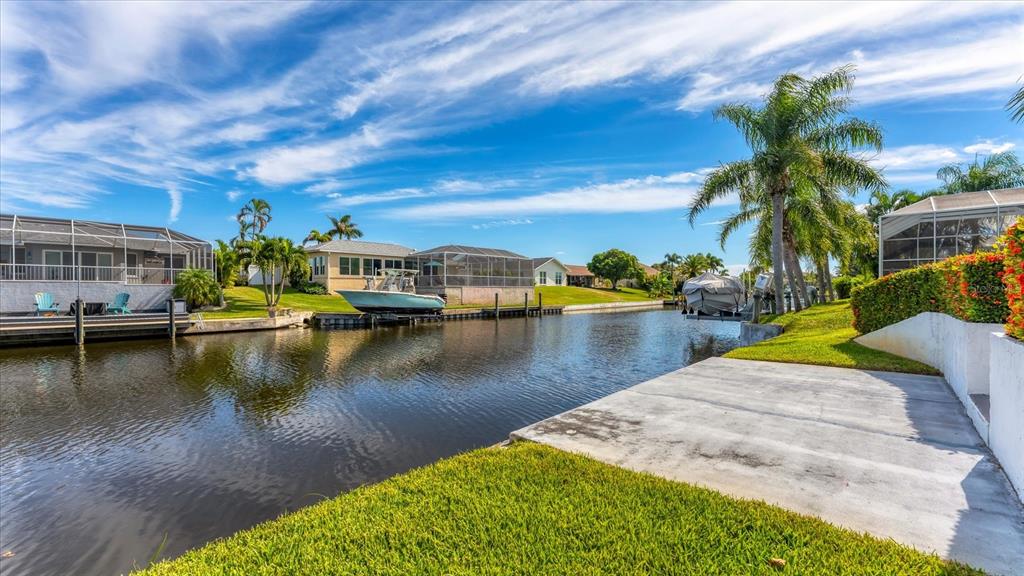 4515 Mangrove Point Road Bradenton, FL 34210 - Photo 2 of 59 a view of a lake with houses