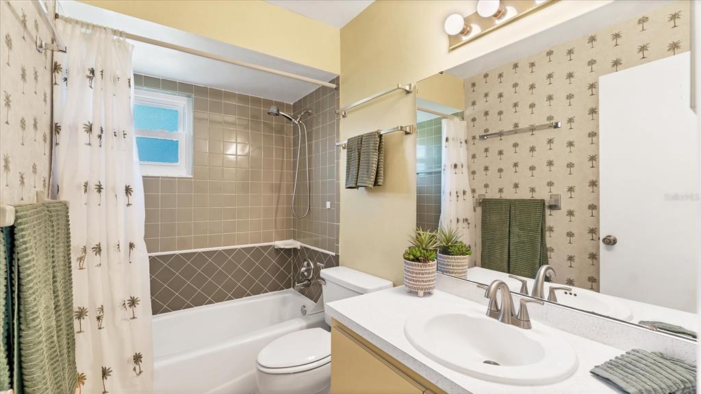 4515 Mangrove Point Road Bradenton, FL 34210 - Photo 27 of 59 a bathroom with a sink toilet and shower