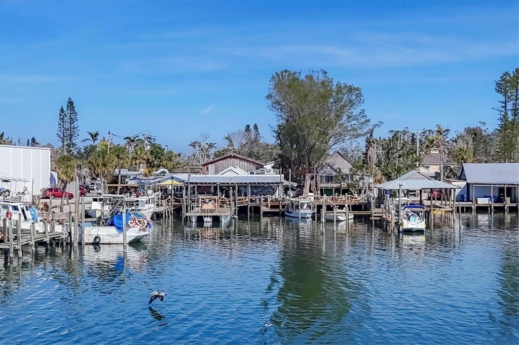 4515 Mangrove Point Road Bradenton, FL 34210 - Photo 50 of 59 a view of a swimming pool with outdoor seating