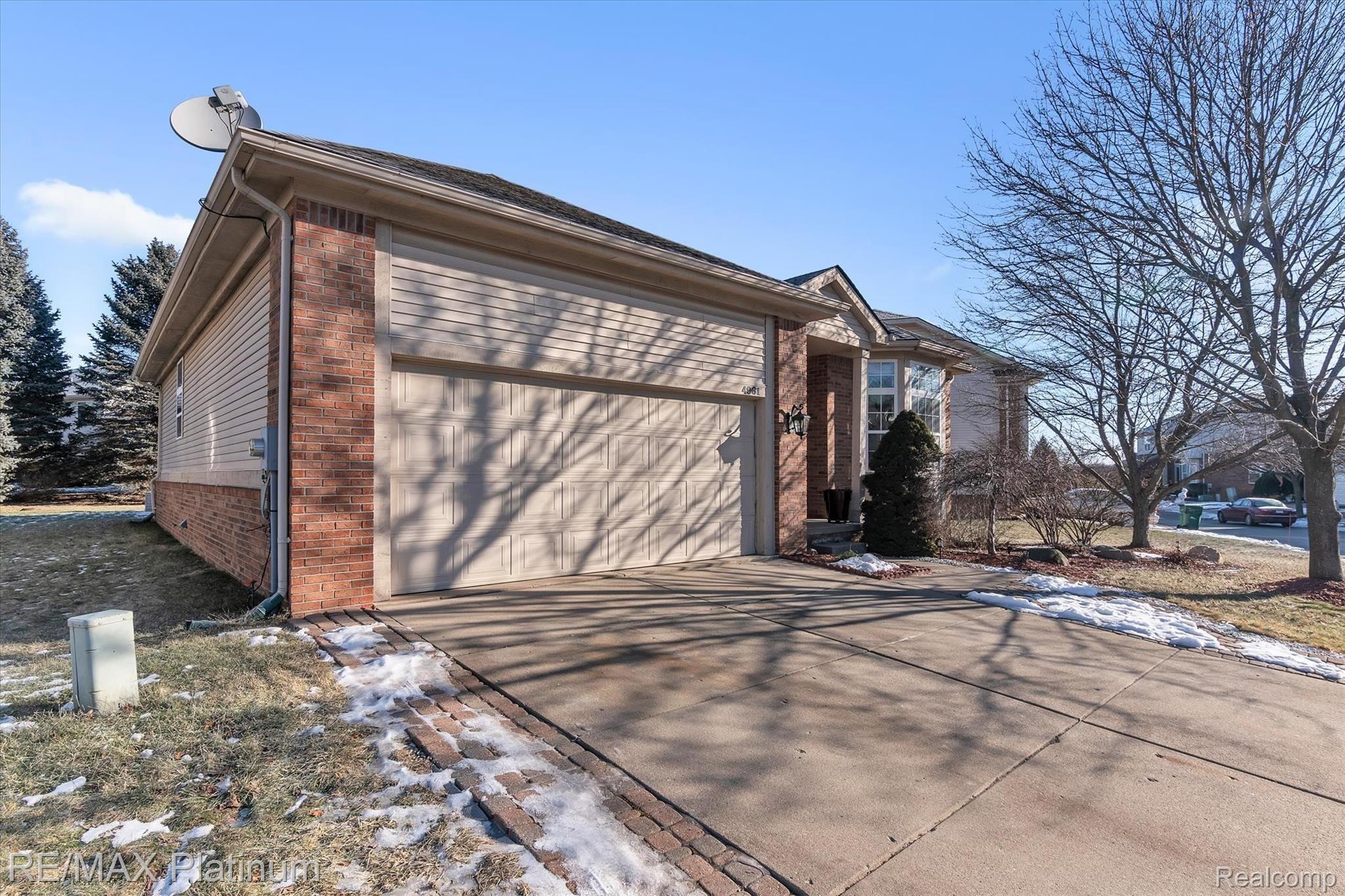 4961 Carrington Drive Rochester, MI 48306 - Photo 2 of 37 Large 2 Car garage with plenty of parking space