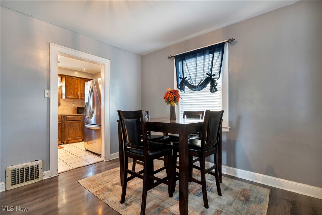1361 Crescent Road Southwest Canton, OH 44710 - Photo 11 of 36 Dining space featuring light wood-style flooring