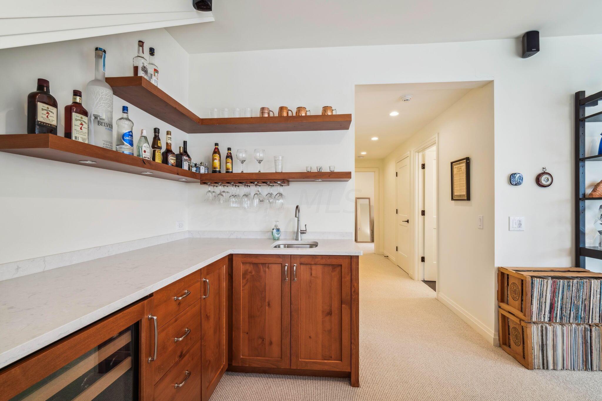 7805 Cubbage Road Westerville, OH 43081 - Photo 86 of 143 LL wet bar with beverage refrigerator.