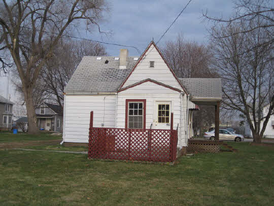 620 South 2nd Street Rochelle, IL 61068 - Photo 2 of 10 a front view of a house with a garden