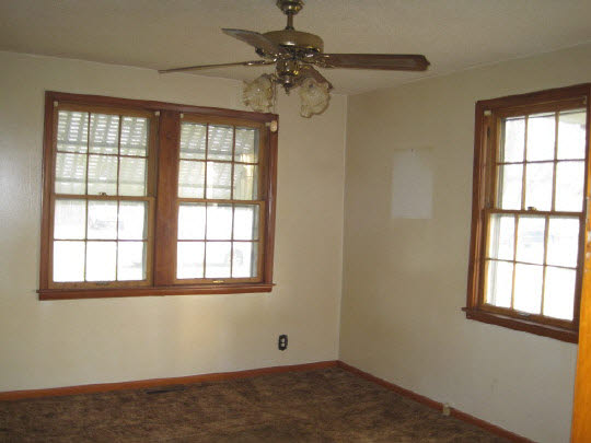 620 South 2nd Street Rochelle, IL 61068 - Photo 3 of 10 a view of an empty room with a window