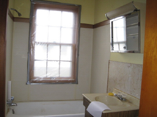 620 South 2nd Street Rochelle, IL 61068 - Photo 8 of 10 a bathroom with a sink and a window