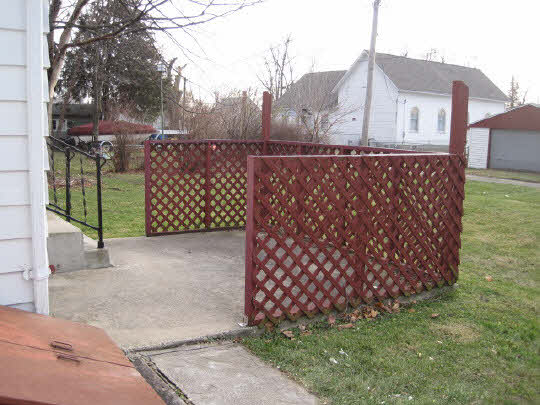 620 South 2nd Street Rochelle, IL 61068 - Photo 9 of 10 a view of a house with a wooden fence