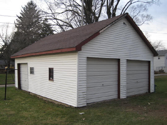 620 South 2nd Street Rochelle, IL 61068 - Photo 10 of 10 a view of a white house with a small yard