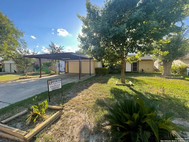 a view of house with yard entertaining space and outdoor seating