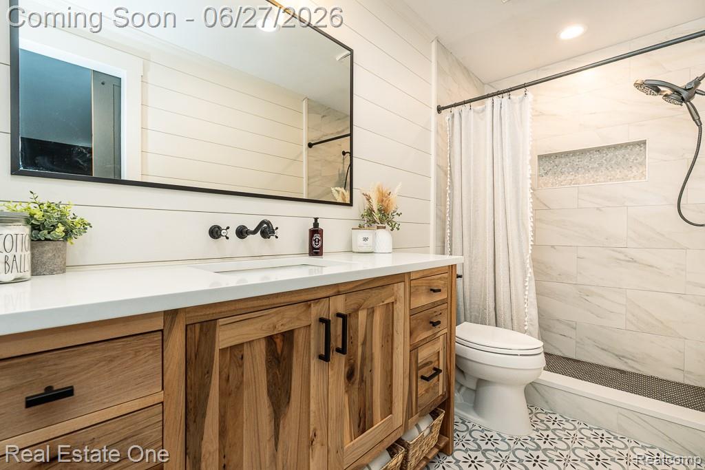 1222 Kings Cove Court, Unit 244 Rochester, MI 48306 - Photo 20 of 44 Totally remodeled with custom built vanity from 1800's vintage reclaimed barn wood, shiplap walls, designer tile floor!