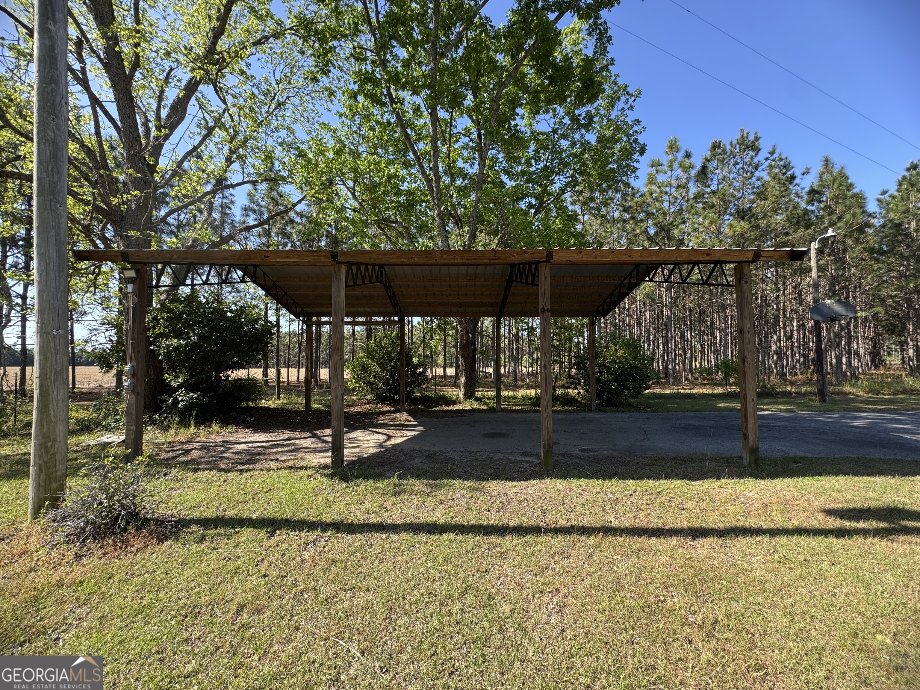 7290 Nevils Groveland Road Pembroke, GA 31321 - Photo 12 of 45 a view of a park with iron fence