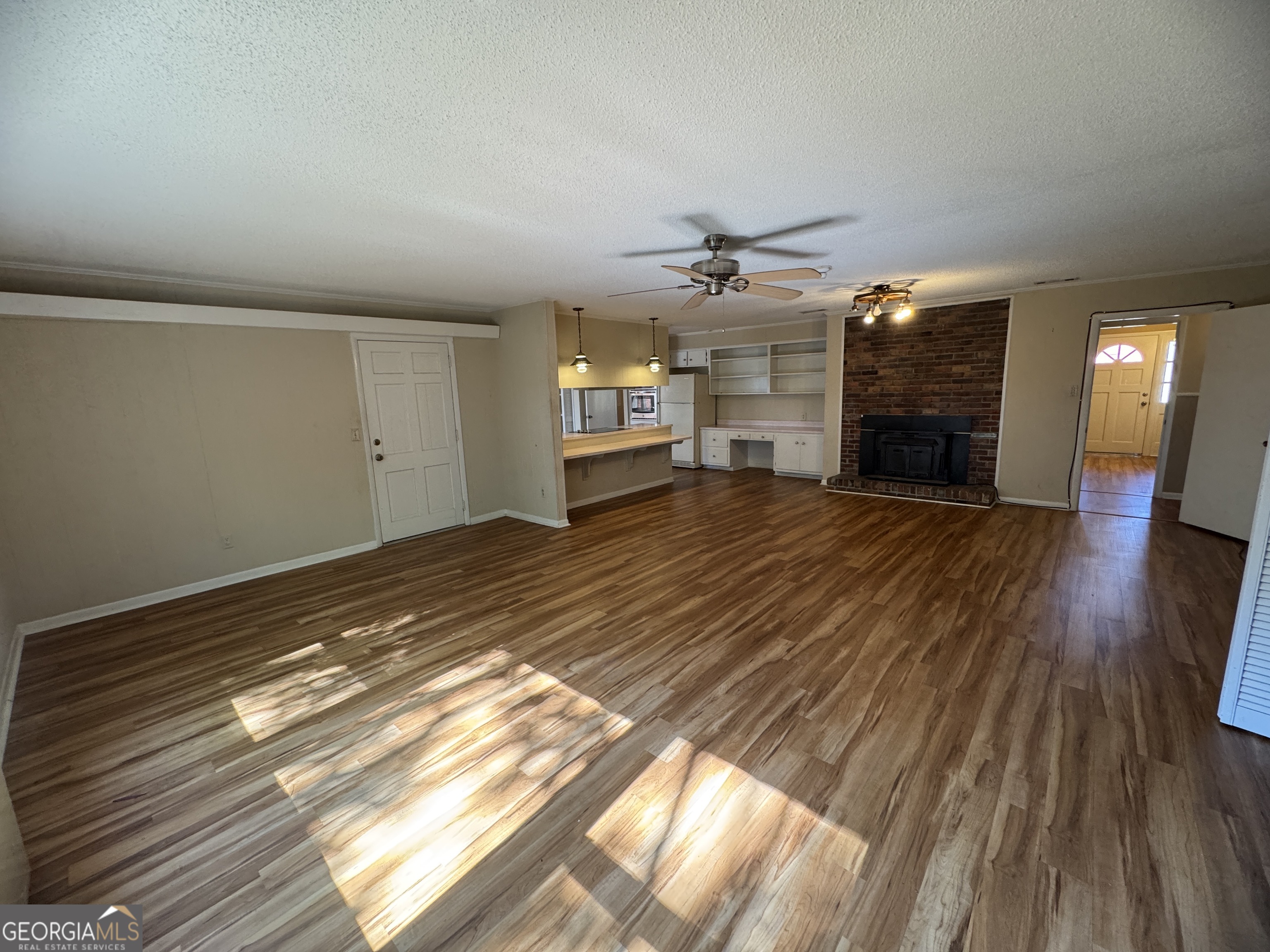 7290 Nevils Groveland Road Pembroke, GA 31321 - Photo 20 of 45 a view of a livingroom with a fireplace