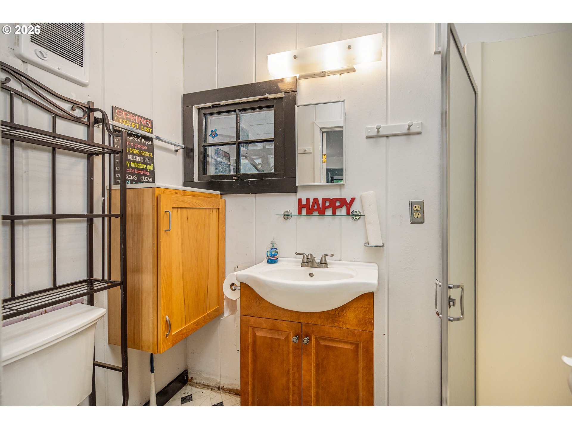 49091 Salt Creek Road Oakridge, OR 97463 - Photo 14 of 16 a bathroom with a sink mirror and a shower