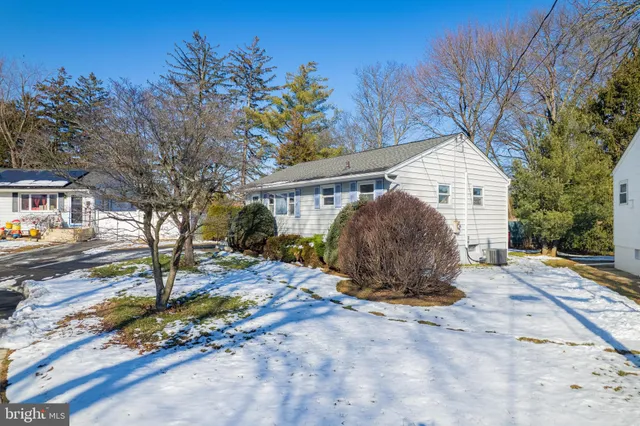 a view of outdoor space with seating and trees
