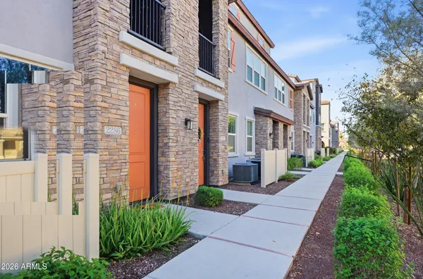 a view of a building with a yard