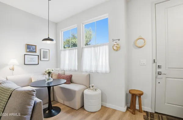 a living room with furniture and a window