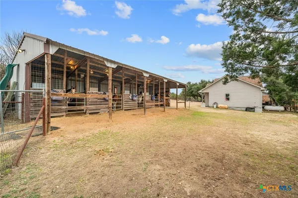 a view of a balcony with car parked