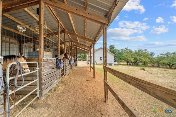 a living room with furniture and flat screen tv