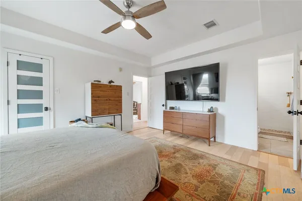 a bedroom with a bed and furniture