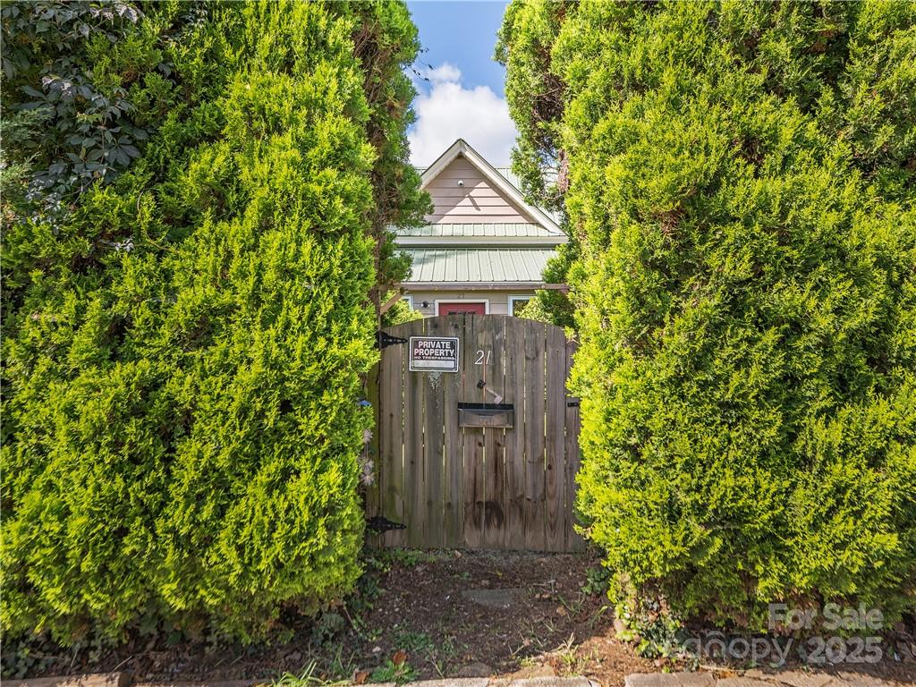 21 Pearl Street Asheville, NC 28801 - Photo 16 of 26 a front view of a house with a tree